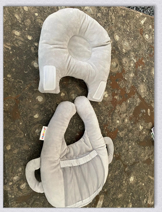 A soft, supportive pillow designed for hands-free baby feeding, featuring a secure bottle holder and premium, BPA-free materials.