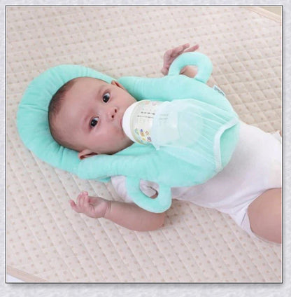 A soft, supportive pillow designed for hands-free baby feeding, featuring a secure bottle holder and premium, BPA-free materials.