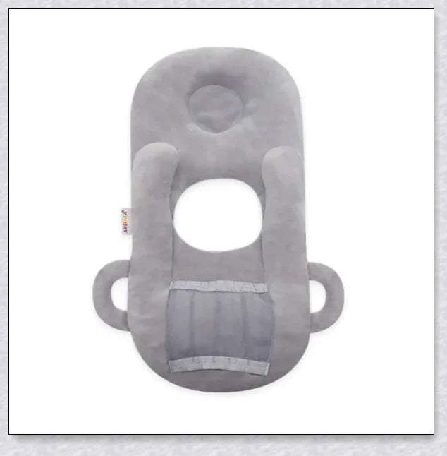 A soft, supportive pillow designed for hands-free baby feeding, featuring a secure bottle holder and premium, BPA-free materials.
