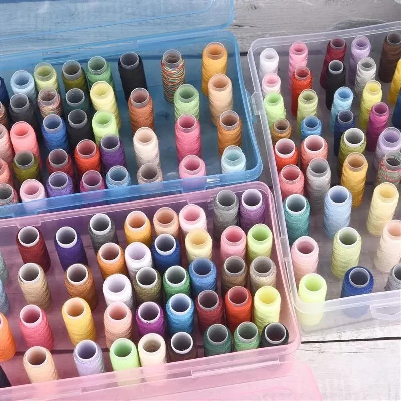 Transparent plastic sewing storage box with 42 labelled compartments for needles and threads