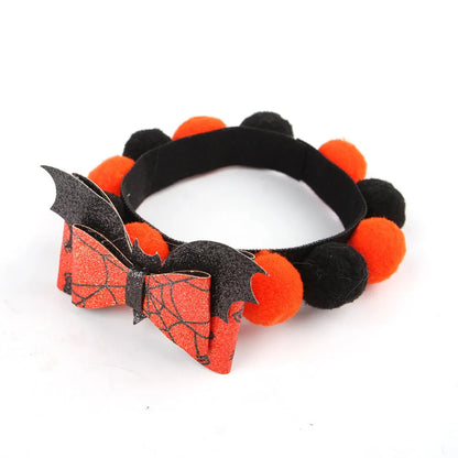 Halloween fur ball pet collar with pumpkin, pirate, witch and skull designs in six colour options