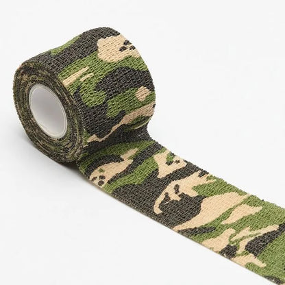 Roll of non-woven elastic camouflage bandage tape in a forest pattern, 4.5 metres long and 5cm wide.