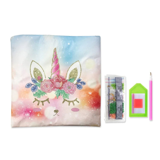 Handmade mandala pattern cushion cover with diamond painting accessories on wooden table