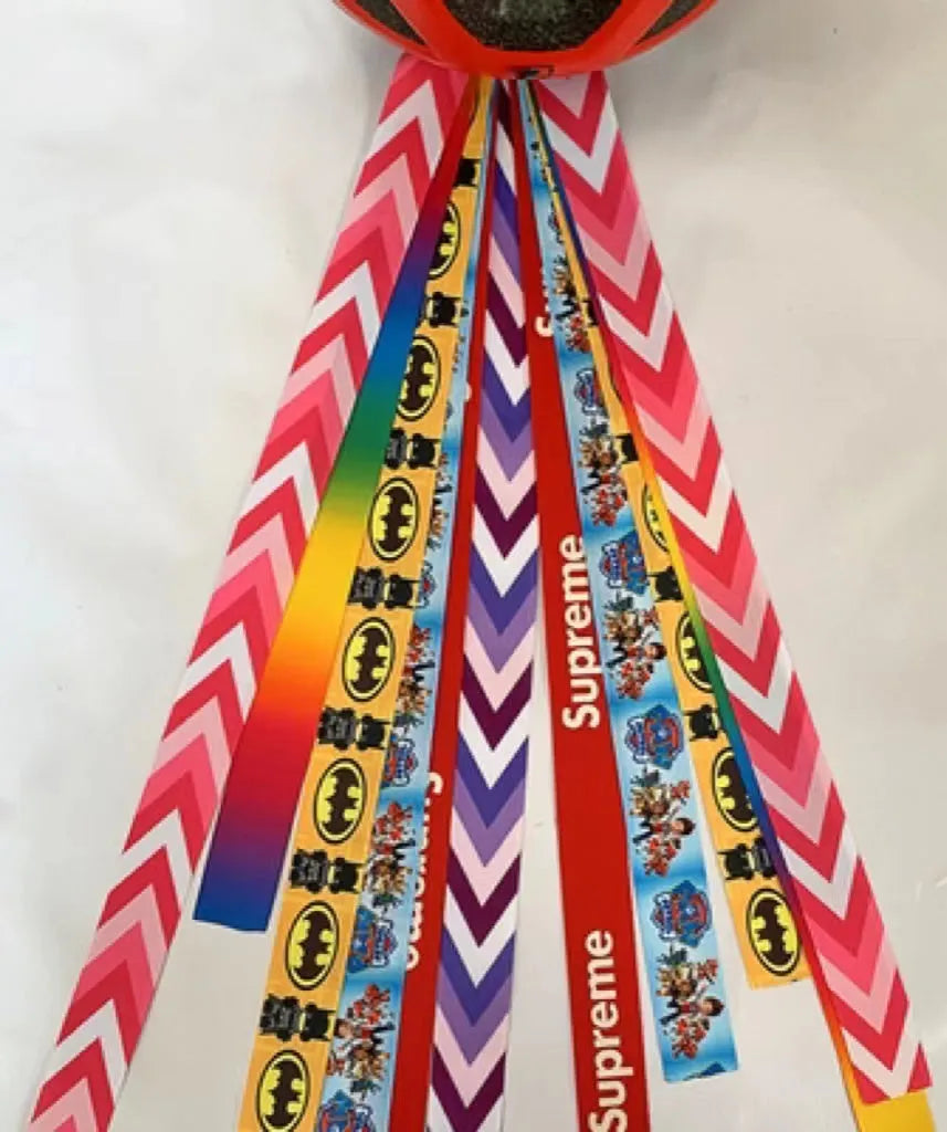 Children's helmet streamer with 60 cm polyester ribbon in colours like apricot and khaki for roller skating and skiing