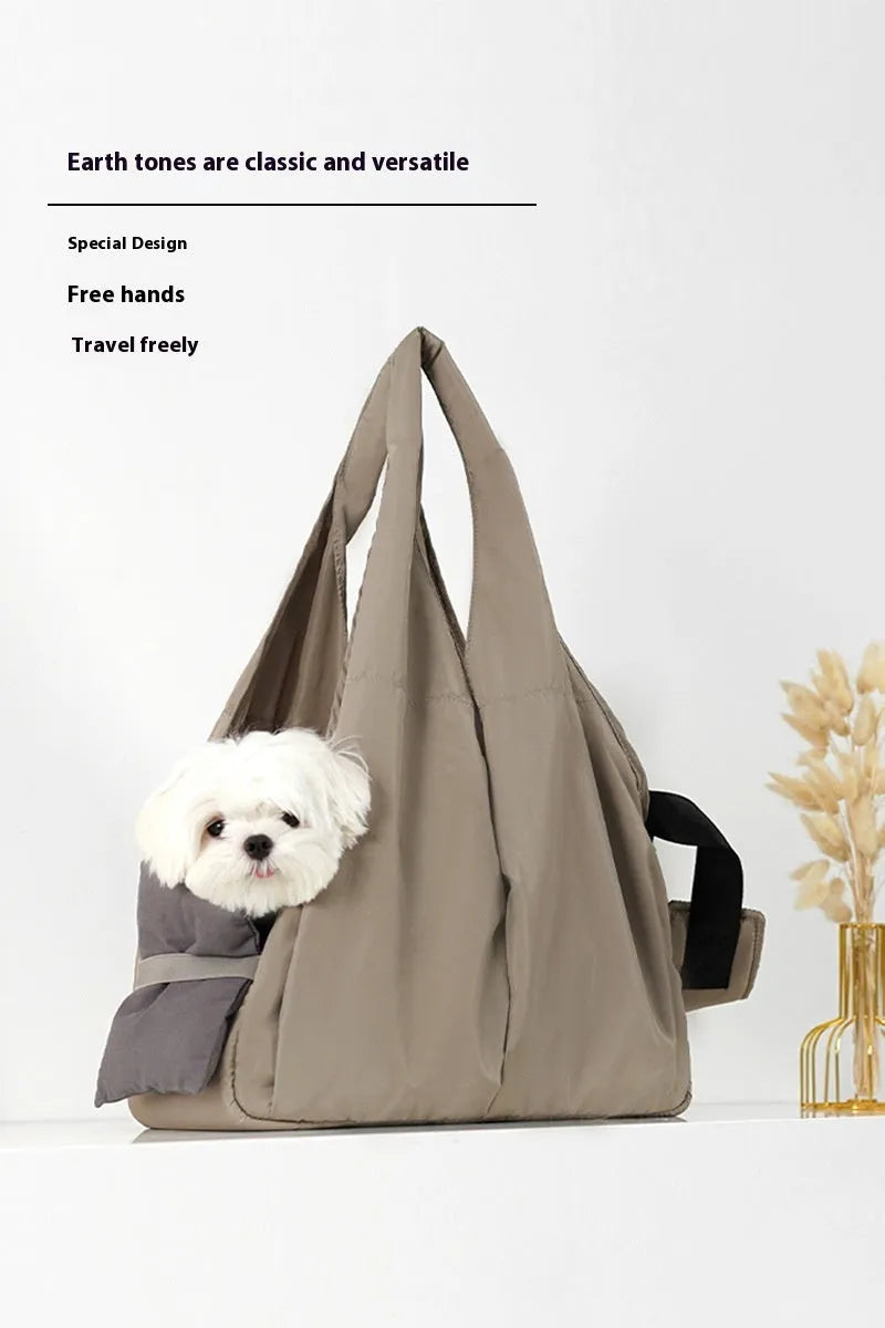 Apricot coloured soft cloth portable pet carrier handbag for small dogs and cats.