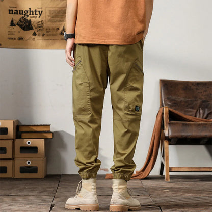 Men's tapered ankle harem trousers in cotton fabric with mid-waist fit