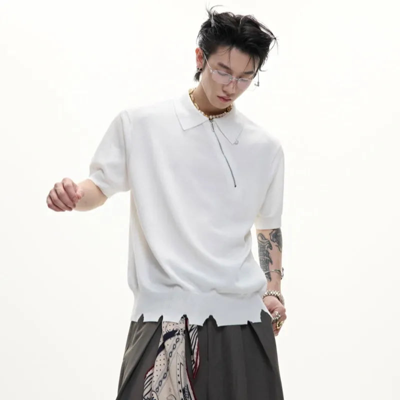 Men's slim-fit black knitted polo shirt with an oblique diagonal zipper and short sleeves.