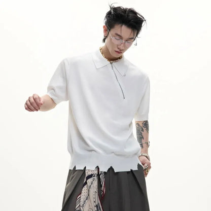 Men's slim-fit black knitted polo shirt with an oblique diagonal zipper and short sleeves.