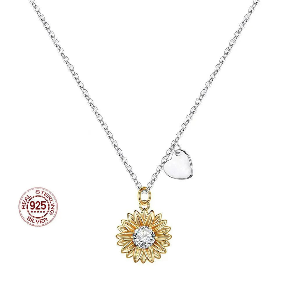 925 silver sunflower necklace with adjustable chain showing geometric daisy pendant design and cross chain detail