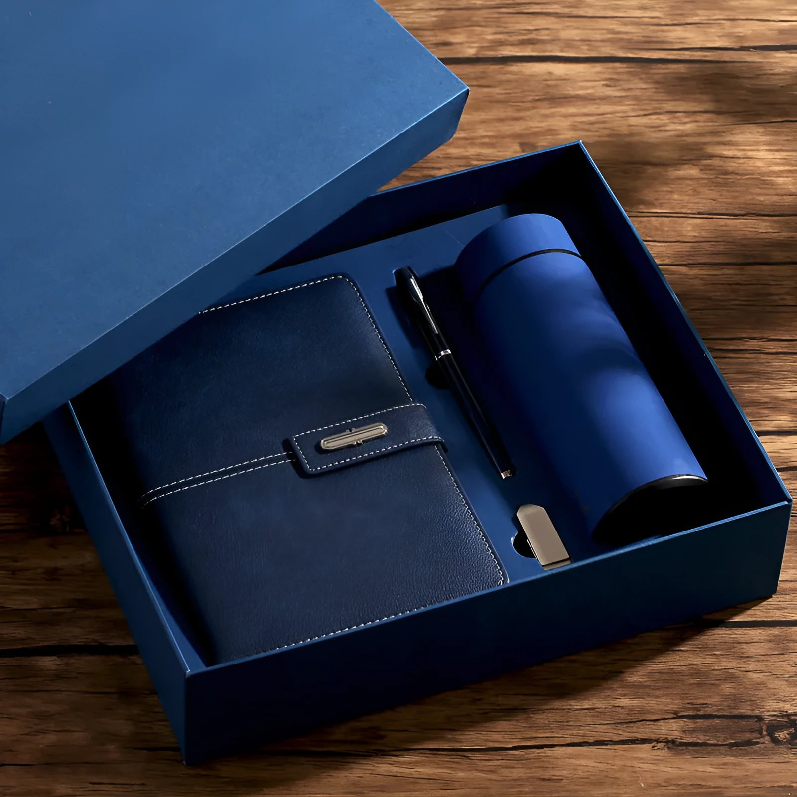 A5 notebook with imitation leather cover in a choice of colours including black, red, green, blue, and orange.