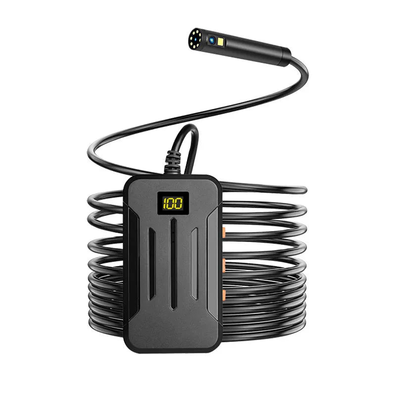 Wireless dual-lens inspection endoscope with IP68 waterproof probe, magnet, and hook accessories on a table.