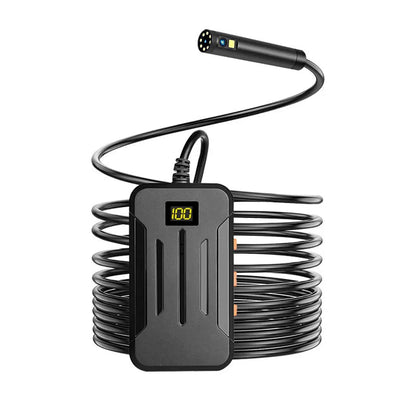 Wireless dual-lens inspection endoscope with IP68 waterproof probe, magnet, and hook accessories on a table.