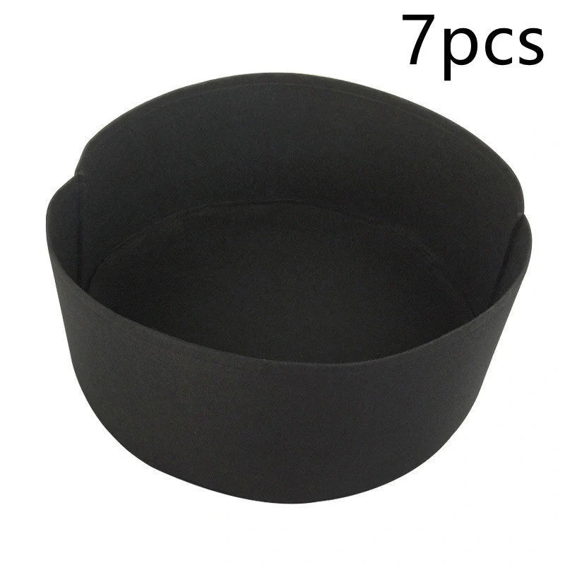 Round fabric grow bags for plants with water-retaining felt material in black and green