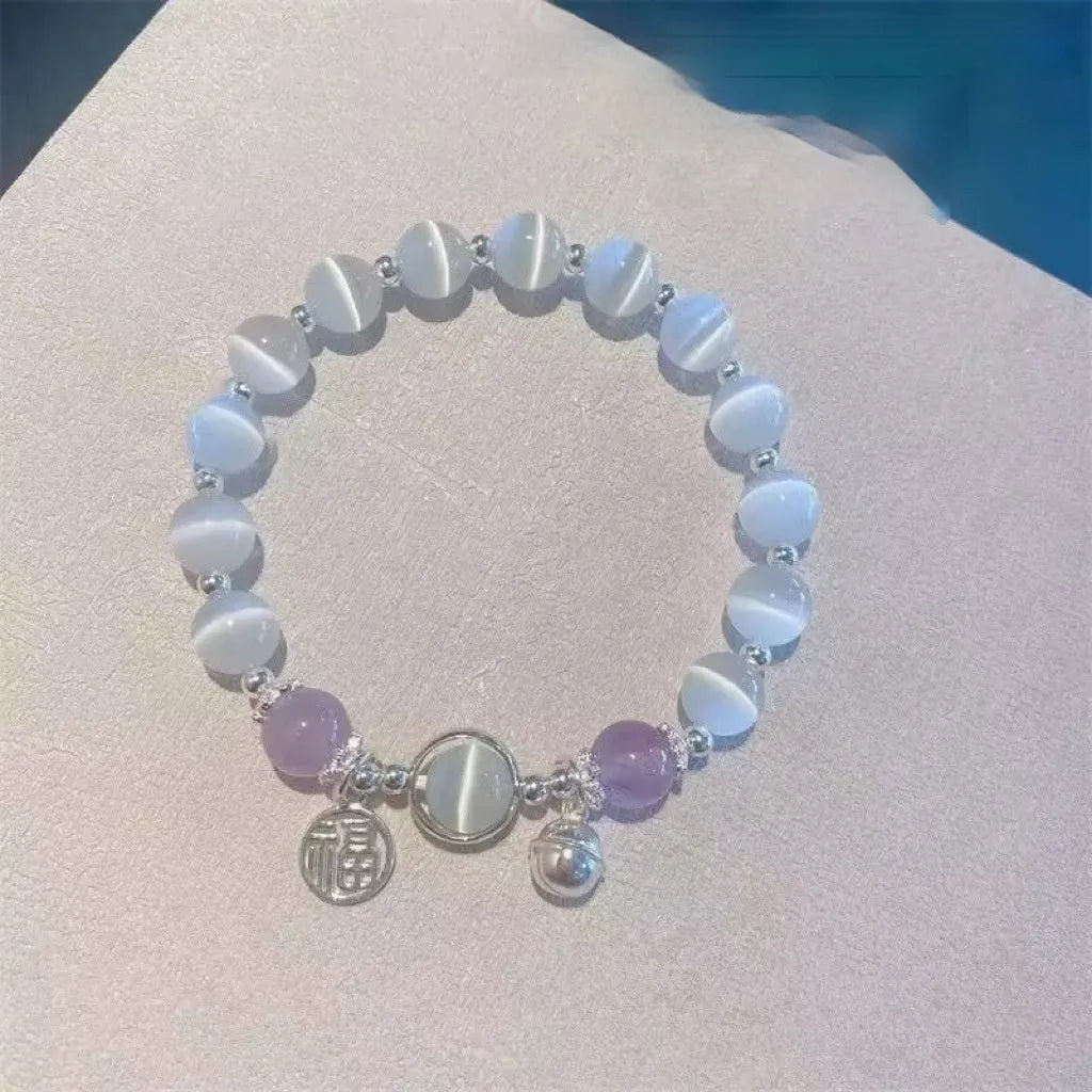Handmade glass butterfly bracelet with drop-shaped beads in moonlight grey colour variation