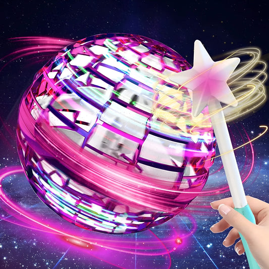 Blue spinning flying ball toy with LED lights hovering above child's hand with magic wand accessory