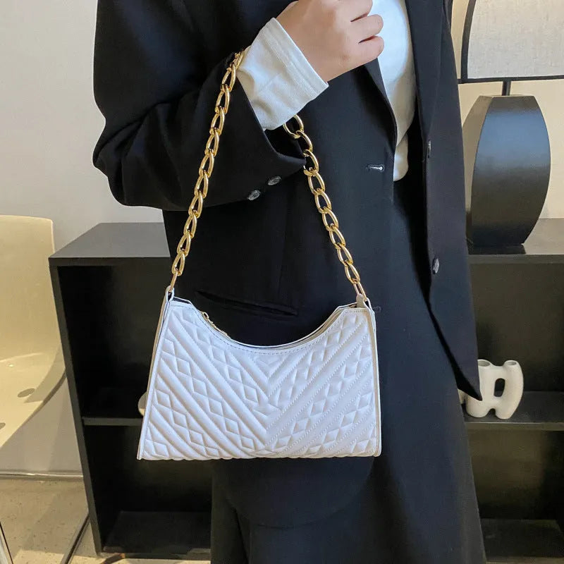 Brown pleated chain baguette shoulder underarm bag with adjustable strap and soft carry handle
