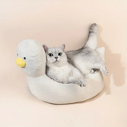 Blue duck shape fluffy pet bed sofa for small dogs and cats on a wooden floor