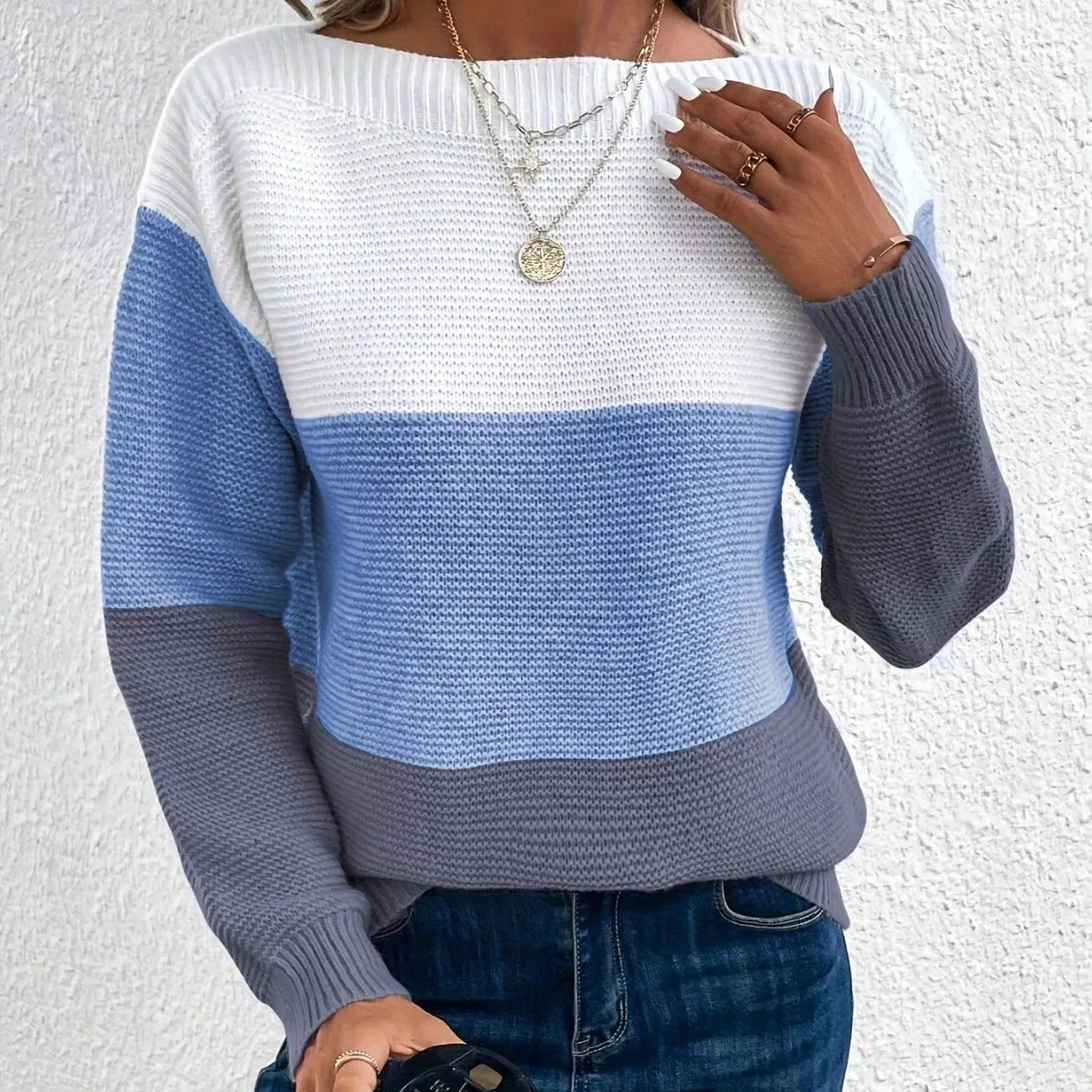 Women's round neck pullover sweater with unique splicing design in various colors