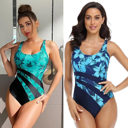 Green women's printed one-piece swimsuit with a conservative briefs design.
