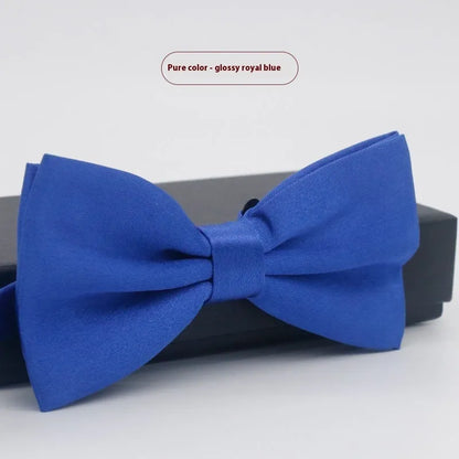 Flat-head self-tie bow tie in a wine red colour, showing its 12cm width and 6cm height dimensions.