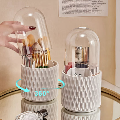 White rotating acrylic makeup brush holder with transparent dust cover on desktop