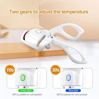 Pink heated electric eyelash curler with USB charging port and curved design with silicone pads