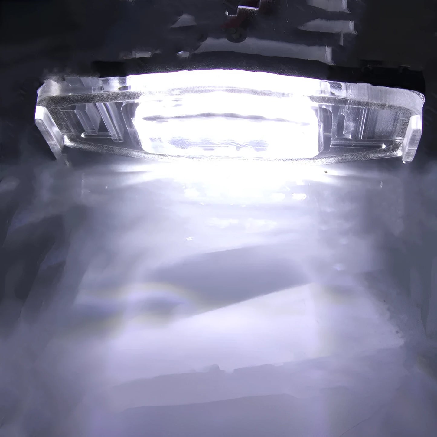 Honda Civic LED licence plate light showing white 6500-7000K illumination with plastic housing