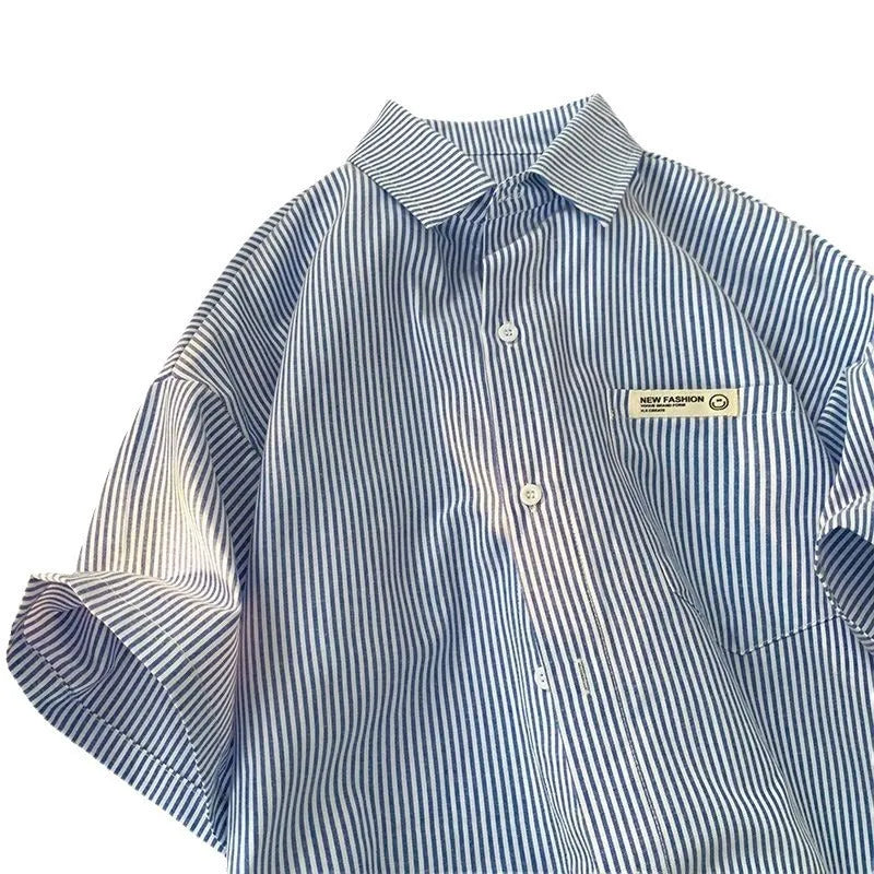 Blue striped loose-fit plus size shirt with half sleeves on hanger