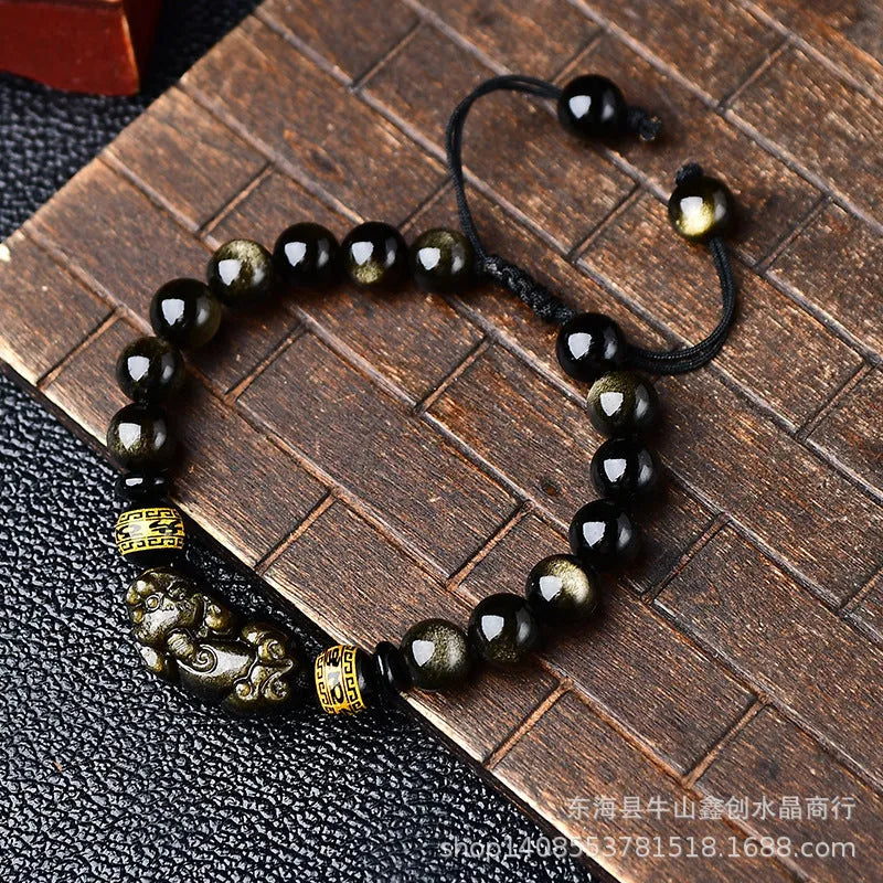 Hand-woven golden obsidian Pi Xiu bracelet with animal design, showing bead size options.