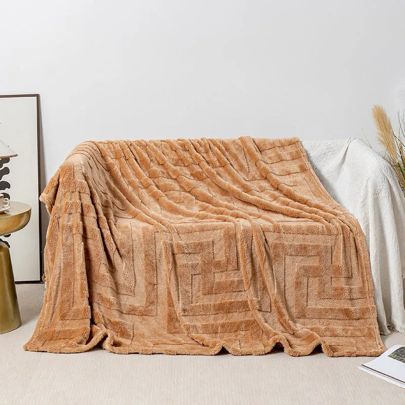 Thick square coral fleece blanket in a modern style, shown in one of five colours including lake blue or khaki.