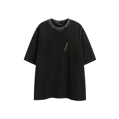 Purple washed cotton T-shirt with embroidery, loose fit, shown on a hanger.