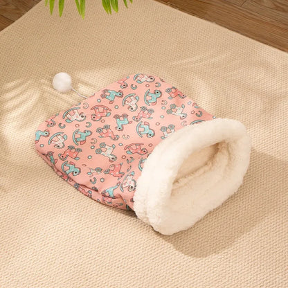 Pink flannel cat sleeping bag nest bed measuring 50 by 40 centimetres.
