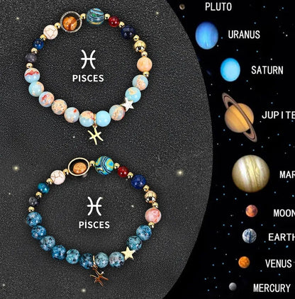 Set of two natural stone beaded bracelets showing zodiac sign designs on an elastic cord.