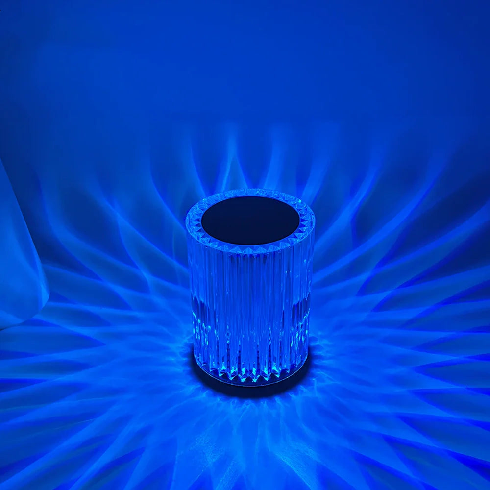 Crystal lamp with acrylic lines showing RGB lighting options on 9cm by 13cm base