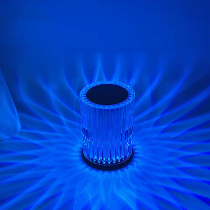 Crystal lamp with acrylic lines showing RGB lighting options on 9cm by 13cm base