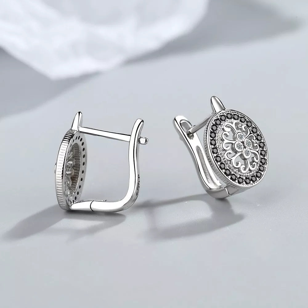 Diamond-encrusted round ear clips in copper white gold plated, geometric women's earrings