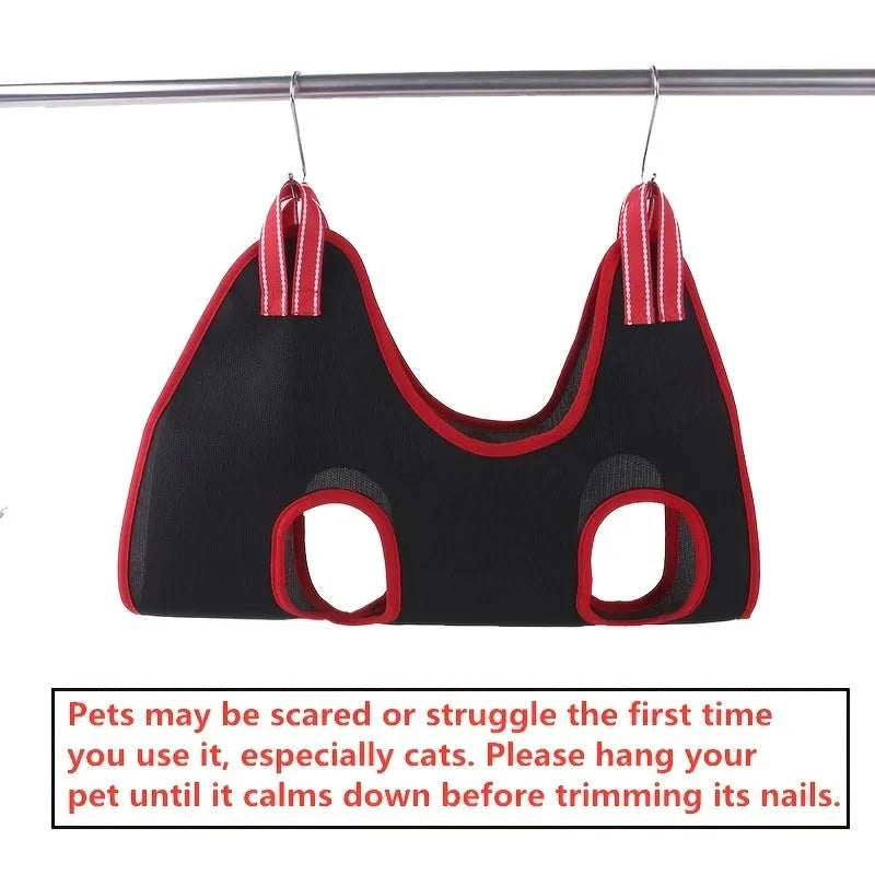 Pet grooming hammock restraint bag hanging for cat or small dog nail clipping and bathing.