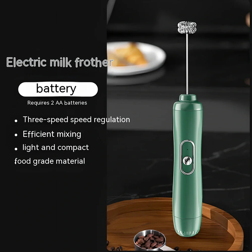 Battery-powered handheld milk frother in retro green, black, or white with stainless steel whisk