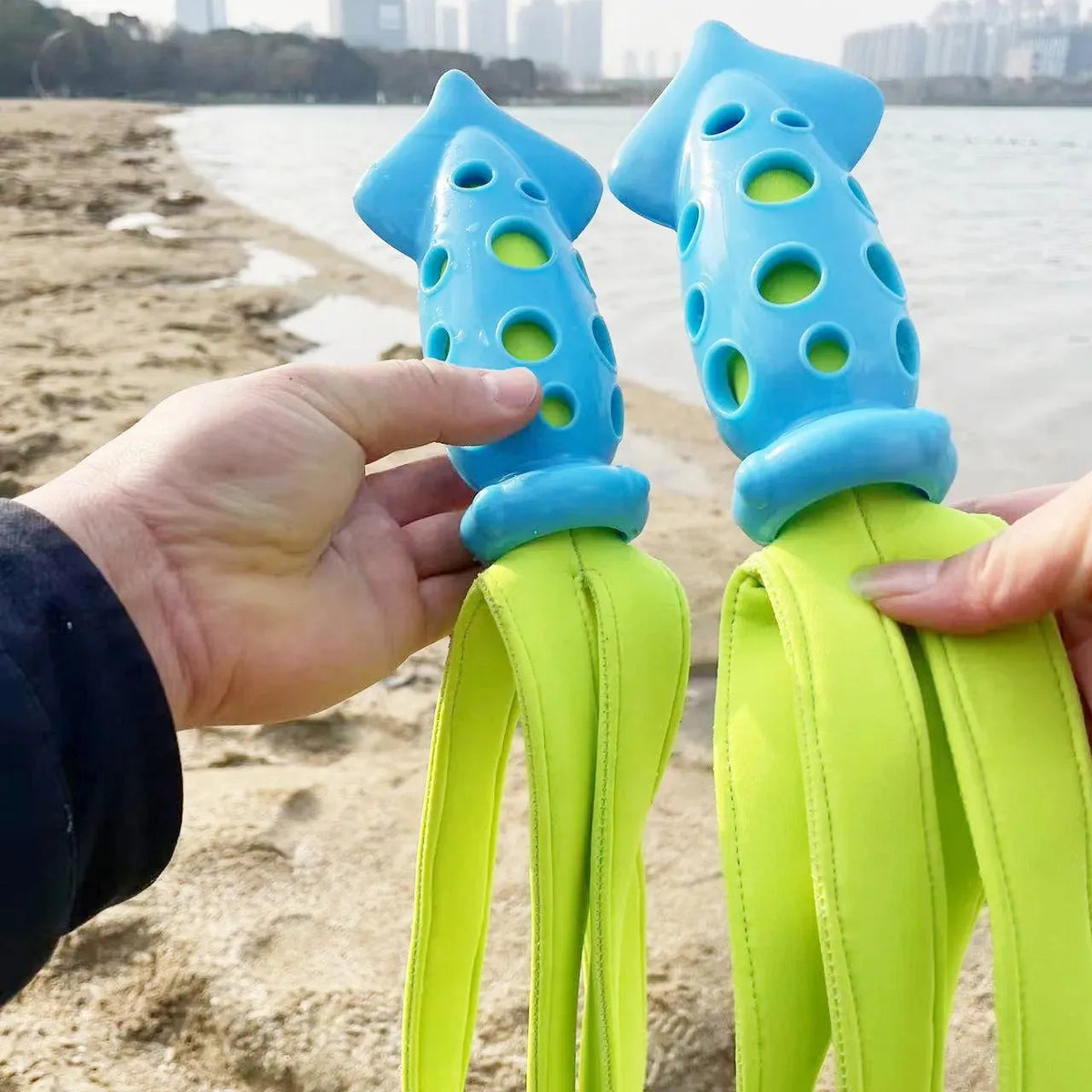 Blue cuttlefish-shaped dog chew toy with squeaker measuring approximately 39 cm