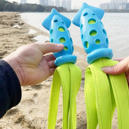 Blue cuttlefish-shaped dog chew toy with squeaker measuring approximately 39 cm