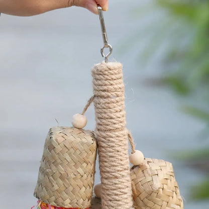 Wooden parrot chew toy with colourful shredded paper measuring 15x35cm
