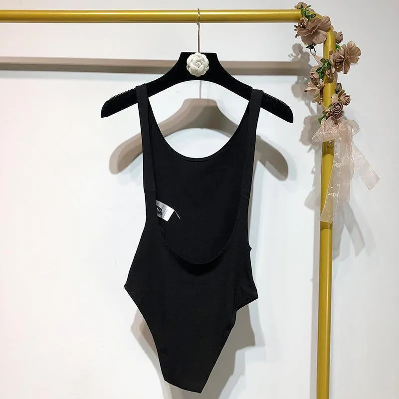 Backless sling jumpsuit for women, slim fit polyester, short 40cm length, black white khaki orange, sizes S M L