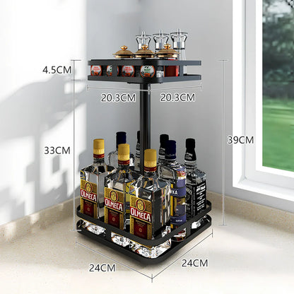 Stainless steel rotating spice rack with two tiers holding 12 bottles on kitchen countertop