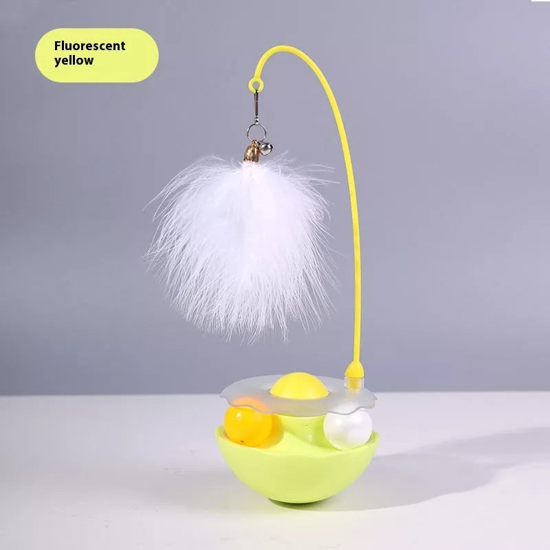 Interactive cat toy with catnip, feather wand, and spinning balls in white, indigo, fluorescent yellow, and pink