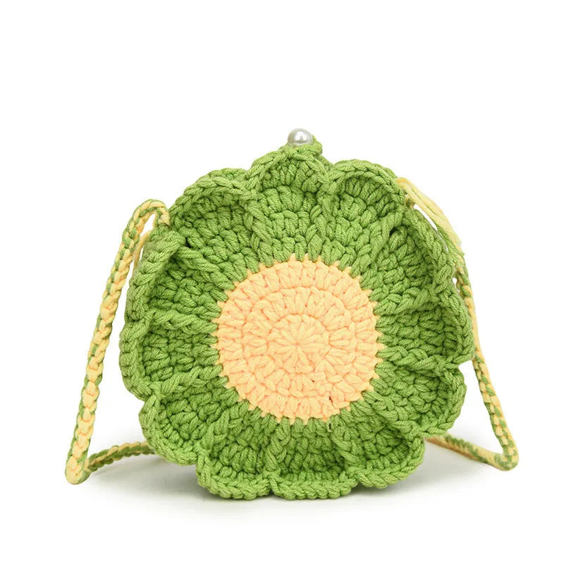 Hand-woven round bag with wool crochet flowers and cotton lining