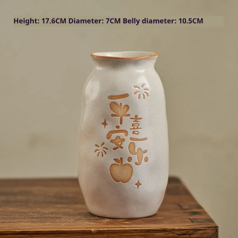 Hand-painted Chinese ceramic vase with carved detail on a desk, shown in Double Happiness colour design.