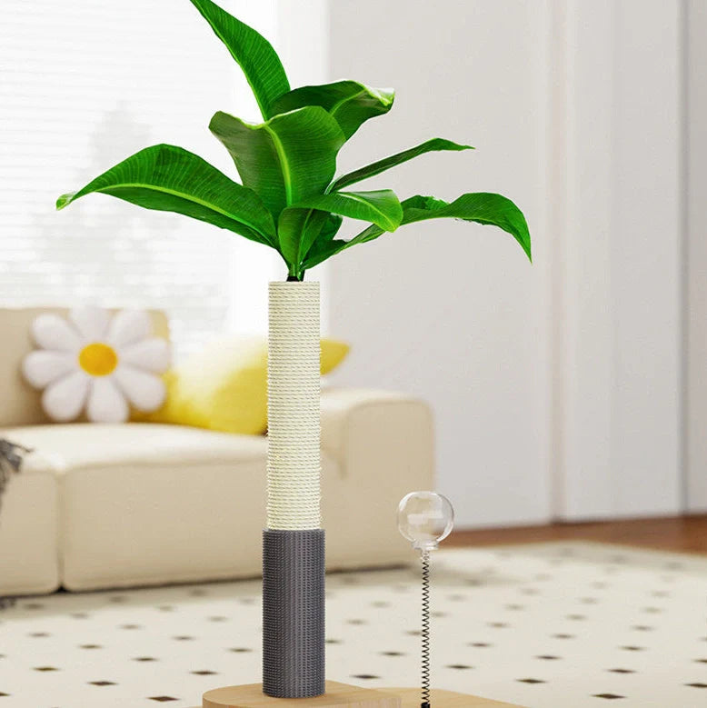 Vertical wooden cat scratching post with chamfered edges and food drop ball attachment