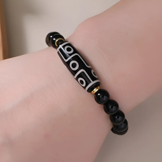 Obsidian agate dzi bead Tibetan bracelet with ethnic pattern on wrist