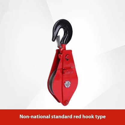 Red lifting pulley with safety latch, forged from A3 steel for industrial use with up to 5000kg load capacity.