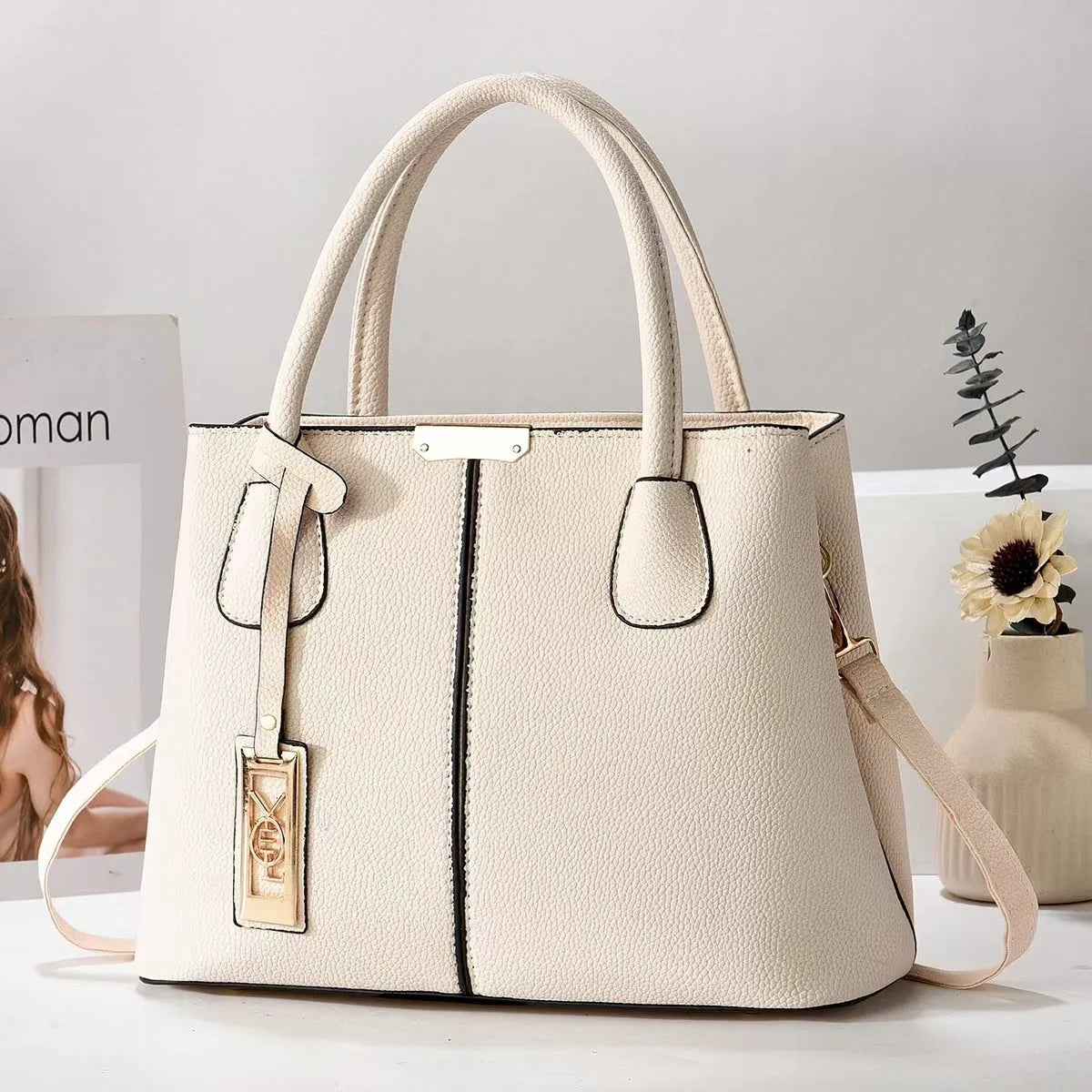 Soft PU leather large capacity shoulder bag in a horizontal square shape with an adjustable strap